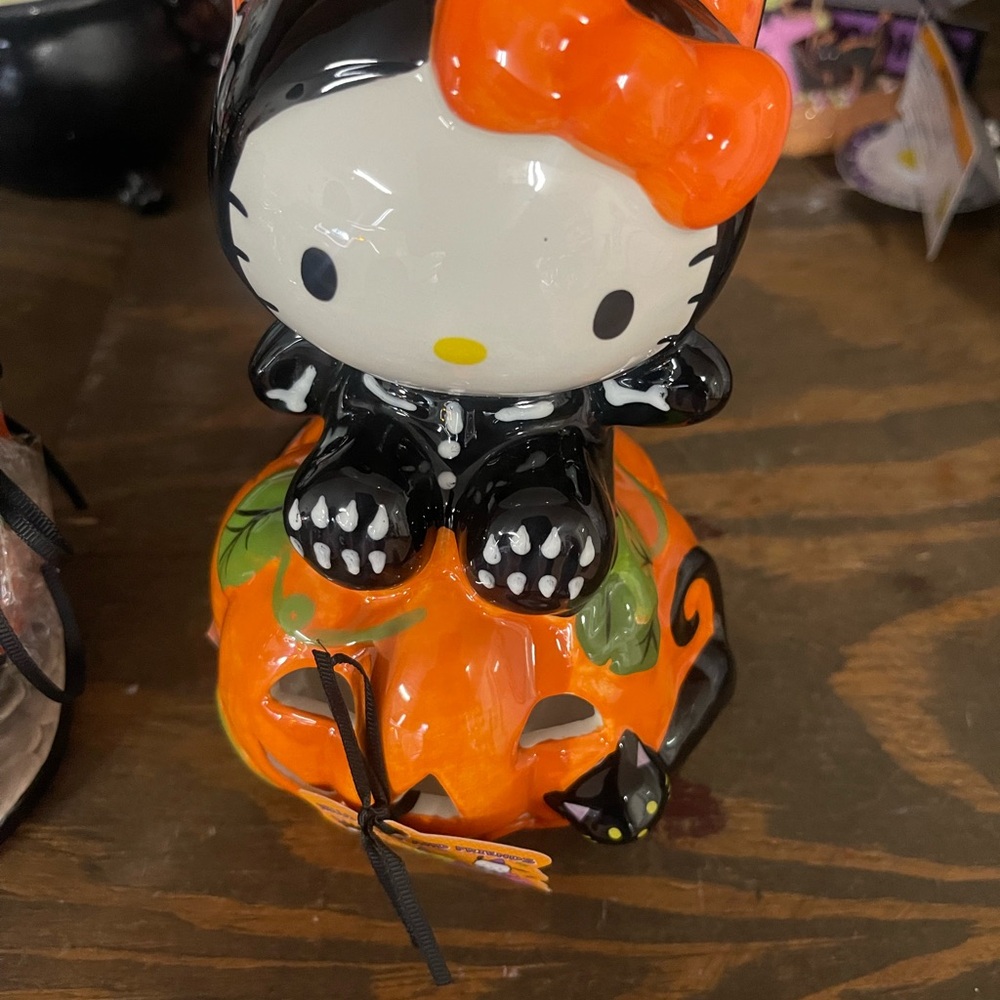 Blue Sky Black and Orange Figurine